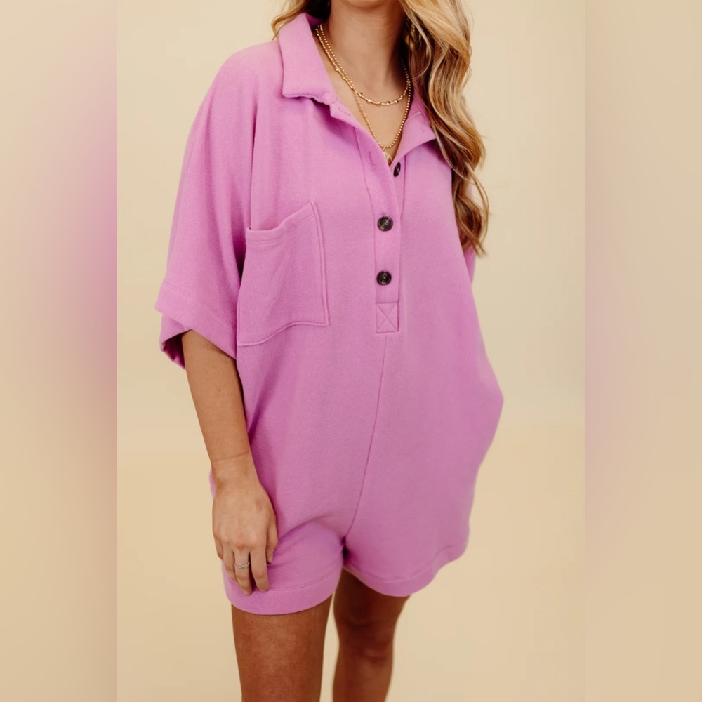 Lavender terry cloth button up romper. Size M.